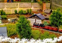 A model train in a train garden