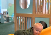 A child climbing a slide