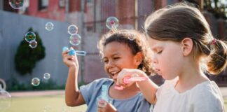 Kids blowing bubbles