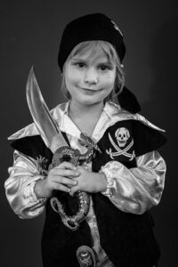 Young girl in pirate costume