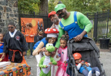 A family dressed as Mario characters at Boo at the Zoo at the Brandywine Zoo
