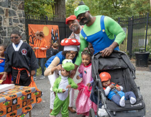 A family dressed as Mario characters at Boo at the Zoo at the Brandywine Zoo