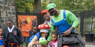 A family dressed as Mario characters at Boo at the Zoo at the Brandywine Zoo